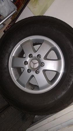 4 tires with Mercedes rims off sprinter van