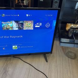 PS4  W/2 Controllers + 32inch Roku TV 