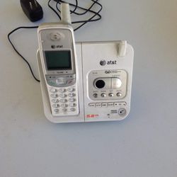 Land line home phone with answering machine ( new battery
