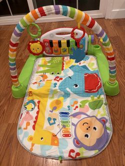 Fisher price kick and play piano