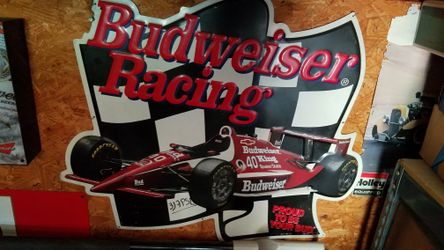 Old Budweiser tin signs and one light up