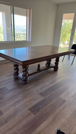 solid wood table. seats up to12