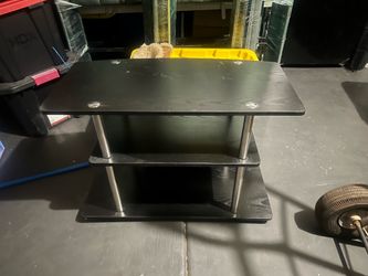 Small black wooden tv stand/shelf
