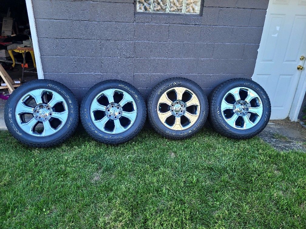 Rims and tires for a Ram 1500 pickup truck. Six Lug.