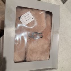 UGG fuzzy / faux-fur slippers (closed-toe, slip-on style)