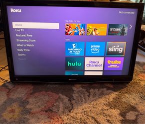 38 inch sharp TV with Mount in the back 📍