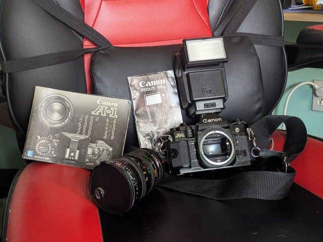 Canon A-1 Camera w/ Manuals, Lens, & Flash