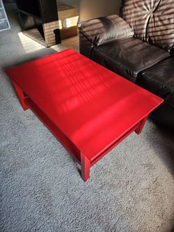 Red painted wood coffee table