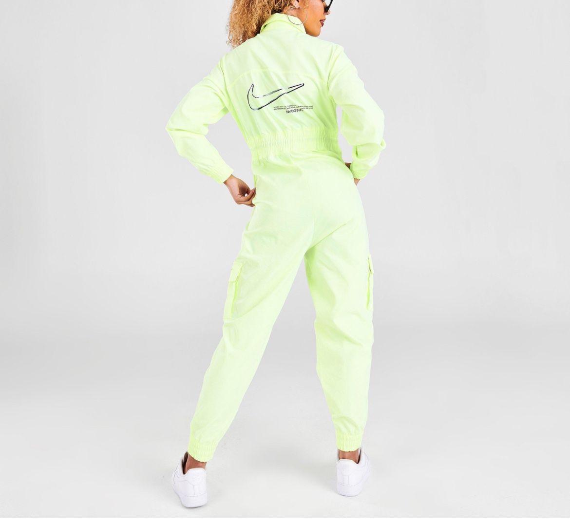 Nike Womens Sportswear Swoosh Utility Jumpsuit RARE Lime Green Size Nike women's apparel in a light green shade. Features a sleek design. XS