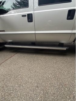 Truck step bars + mud flaps.