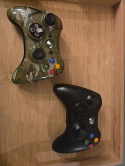 2 genuine Microsoft Xbox 360 wireless controllers. Includes:
