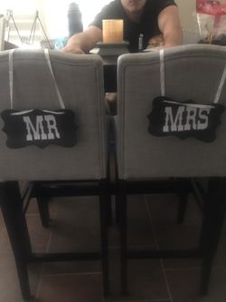 Mr. & Mrs. signs for the chairs