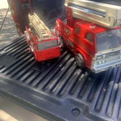  2 VINTAGE TONKA PRESSED STEEL SNORKEL FIRE TRUCKS 15 Dollars For Both 