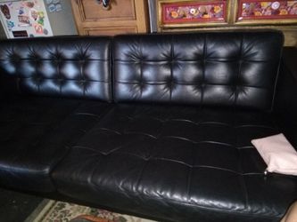 New black leather coach
