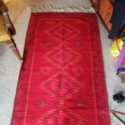 Hand woven Navajo pattern rug