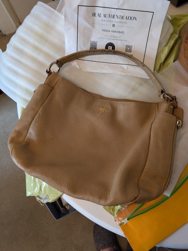 𝐏𝐫𝐚𝐝𝐚 Tan Vitello Daino Side Zip Large Hobo Bag