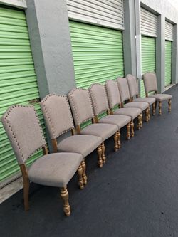 Set of 8 Upholstered Dining Chairs with Nailhead Trim