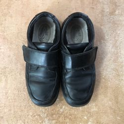 Boys, black hush puppies dress shoes size 13.5