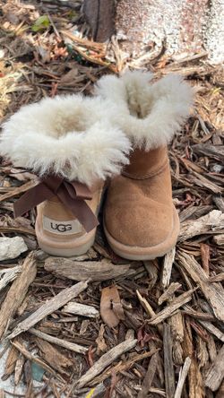 Genuine UGG little girls boots, size 8. In good condition with plenty of life left. Warm, comfy, and perfect for colder weather. Pickup or shipping av