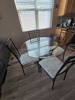 Glass dining table & chairs