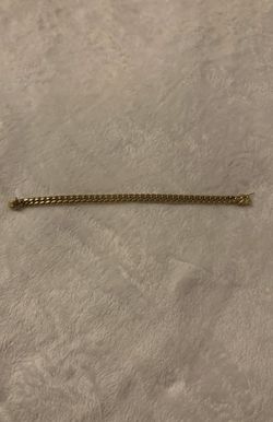 Stainless steel bracelet stamped 14k