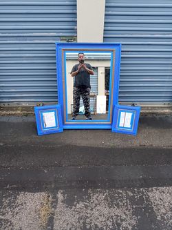 24x36 framed mirror with 2 small one's