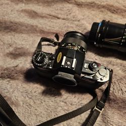 Canon A-1 35mm SLR Camera with 2 Lenses