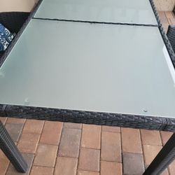 Reduced 59"×36" table glass and Wicker mint condition 1 year old used inside lanai paid $699 plus tax(no chairs)