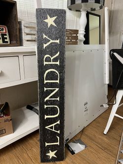 Hanging laundry sign