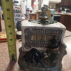 Antique monkey and Organ grinder, television porcelain, flip electric clock.