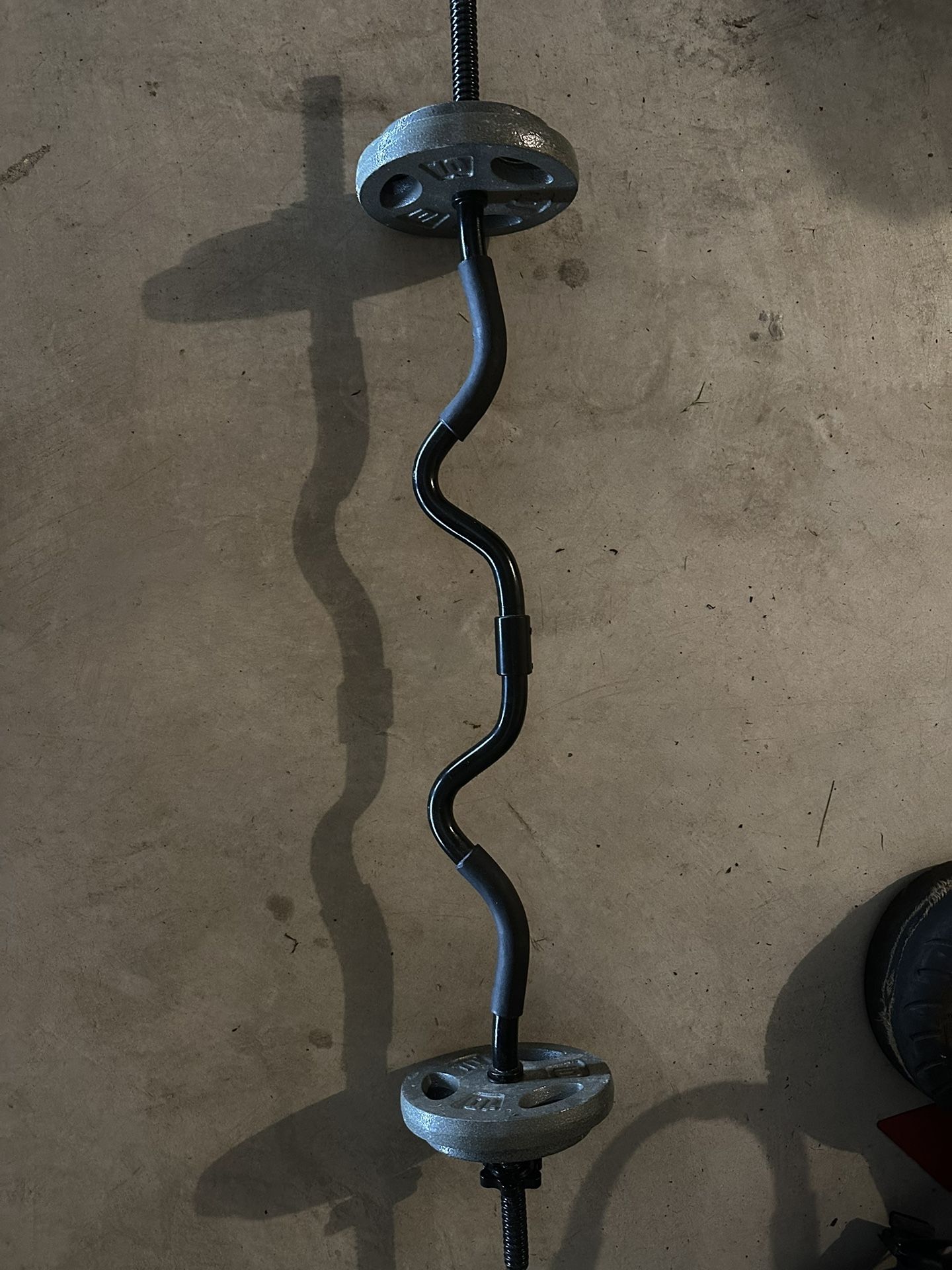 EZ Curl Bar with weights And 30 lb kettlebell