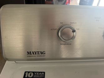 Top load washer and electric dryer