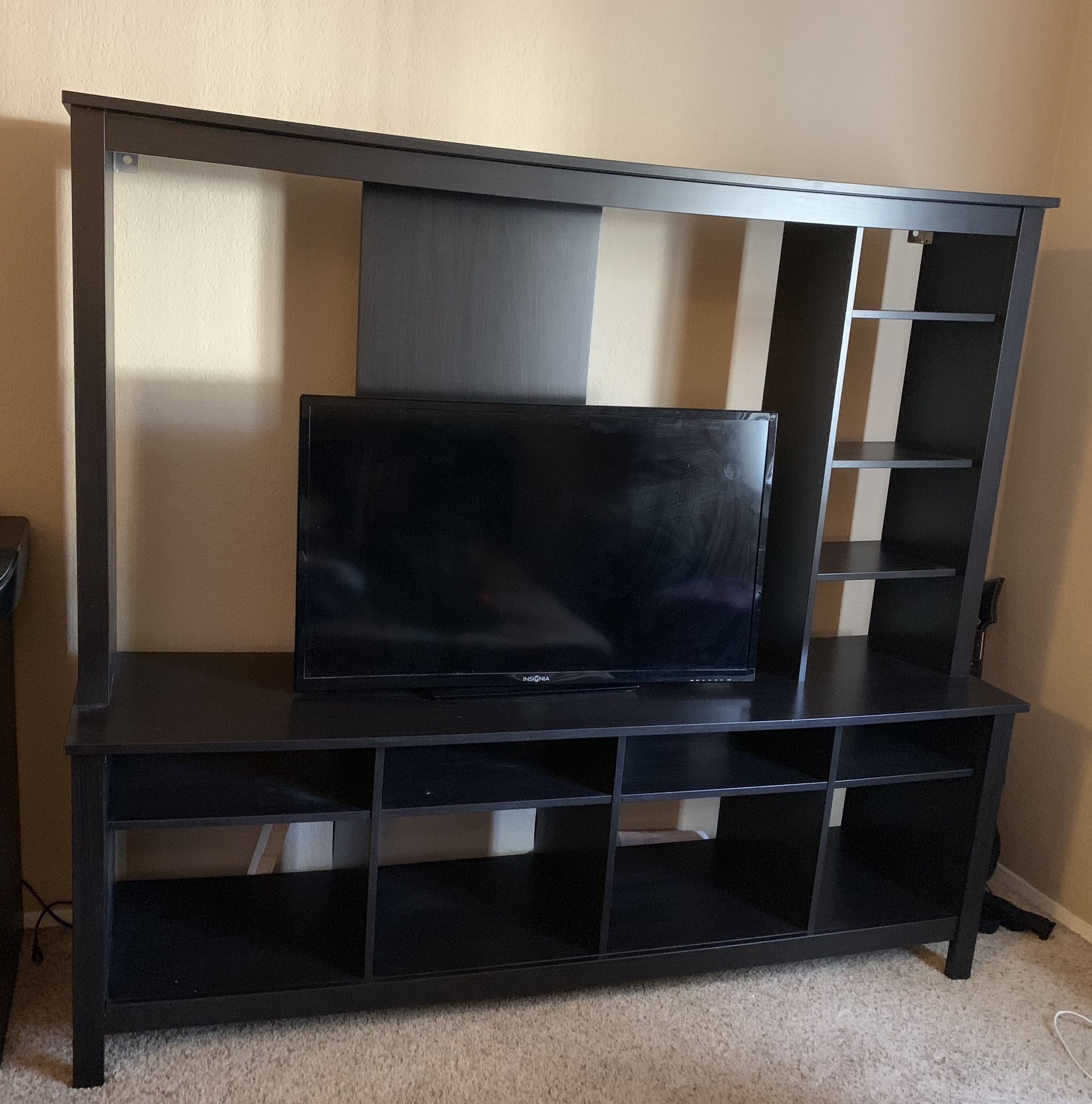 $120 IKEA TV stand (TV not included) it’s about 51/2 feet height and 6 feet wide. Our 65 inch tv fit almost perfect.