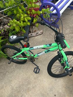 Boy Green and White Bike