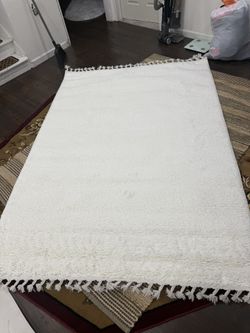 Mercer Shag Plush Tassel Cream 5 ft. x 8 ft. Area Rug