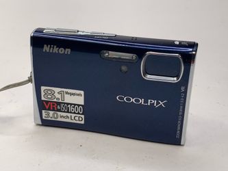 Nikon Coolpix S51 Digital Camera with case, strap, and charger.