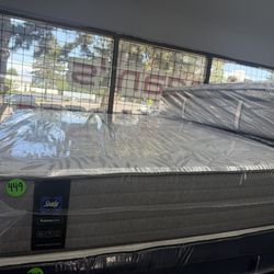 QUEEN SIZE SEALY POSTUREPEDIC (FIRM) MATTRESS & BOX SPRING BED SET