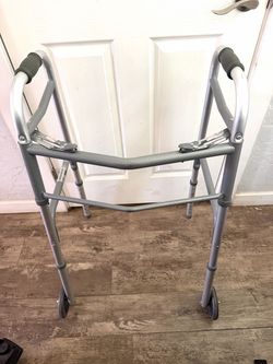 Lumex Dual Release folding wheelchair with wheels and