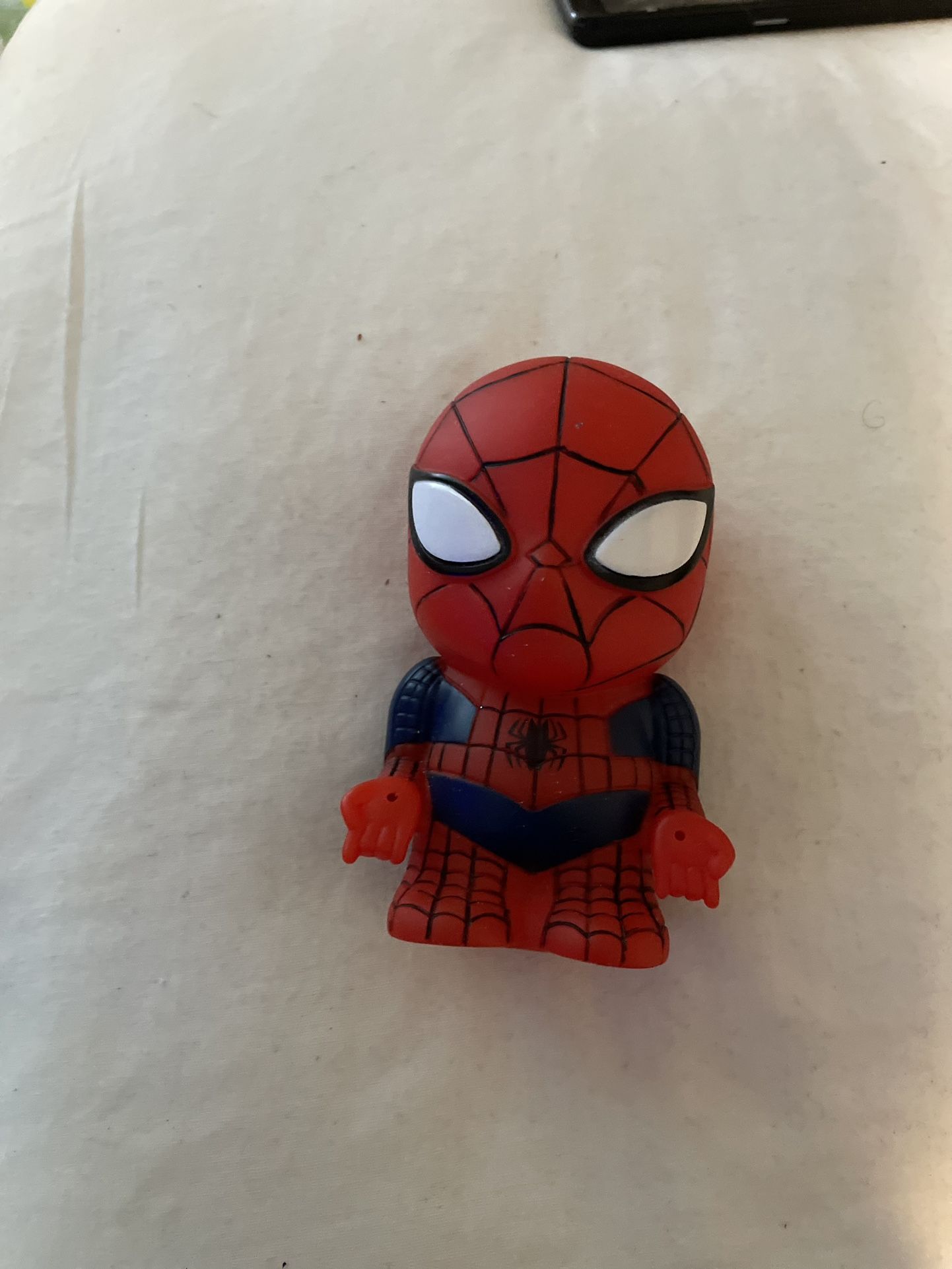 like new small Spiderman toy
