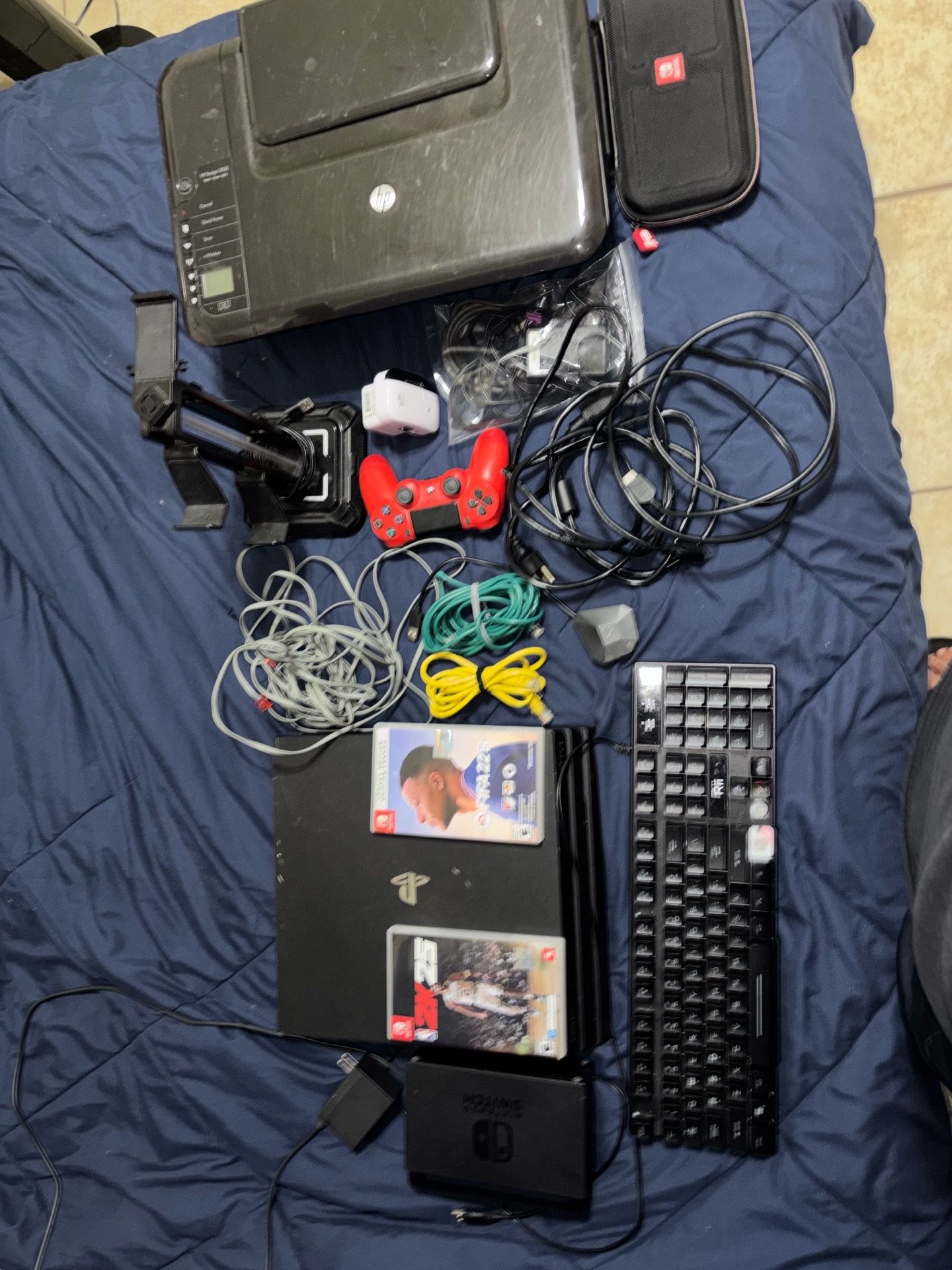 PS4 comes with all the cables Nintendo also has all the cables printer WiFi repeater ps4 controller Nintendo controller keyboard keyboard and mouse ad