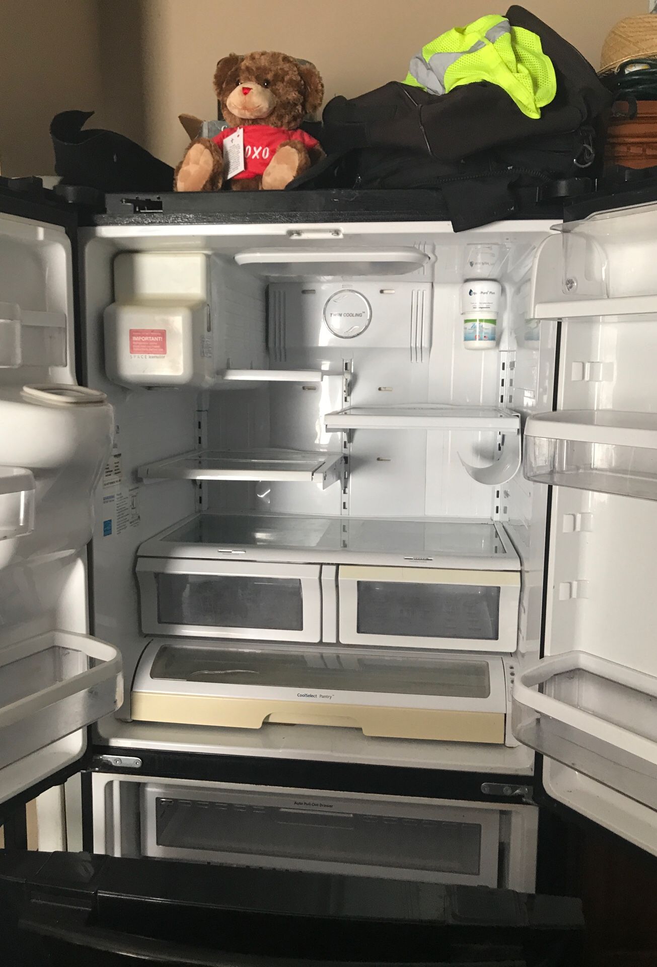 Samsung refrigerator side-by-side freezer underneath $500 or best offer six cheer Diane and Mary said $200 or best offer