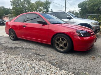 Honda Civic Coupe Red with Aftermarket Wheels
