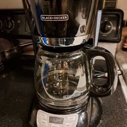 Black +decker 12 cup Quick touch programmable coffee maker...its used but .ive taken really good care of this and i never removed the plastic that cov