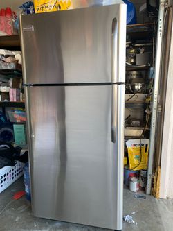 Frigidaire stainless steel refrigerator in great condition for sale