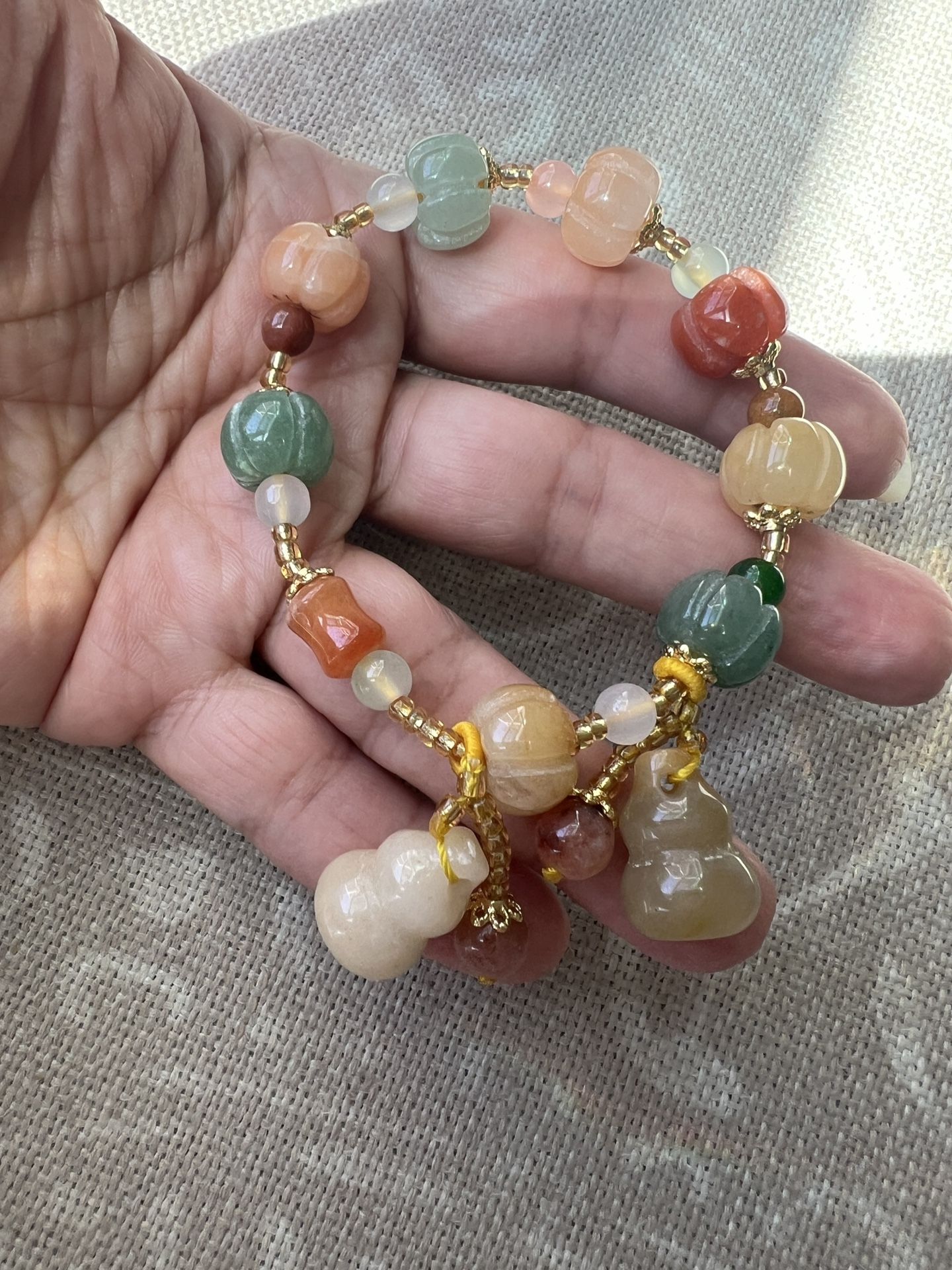 beautiful silk jade hulu charm stretch bracelet with genuine jade gems