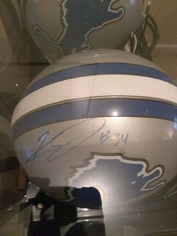 Keven Jones authentic NFL riddell Detroit lions signed helmet in mirrored case with JSA certificate of authenticity