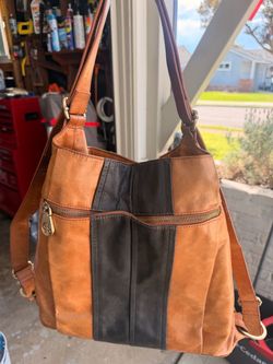 Genuine leather diaper bag/backpack