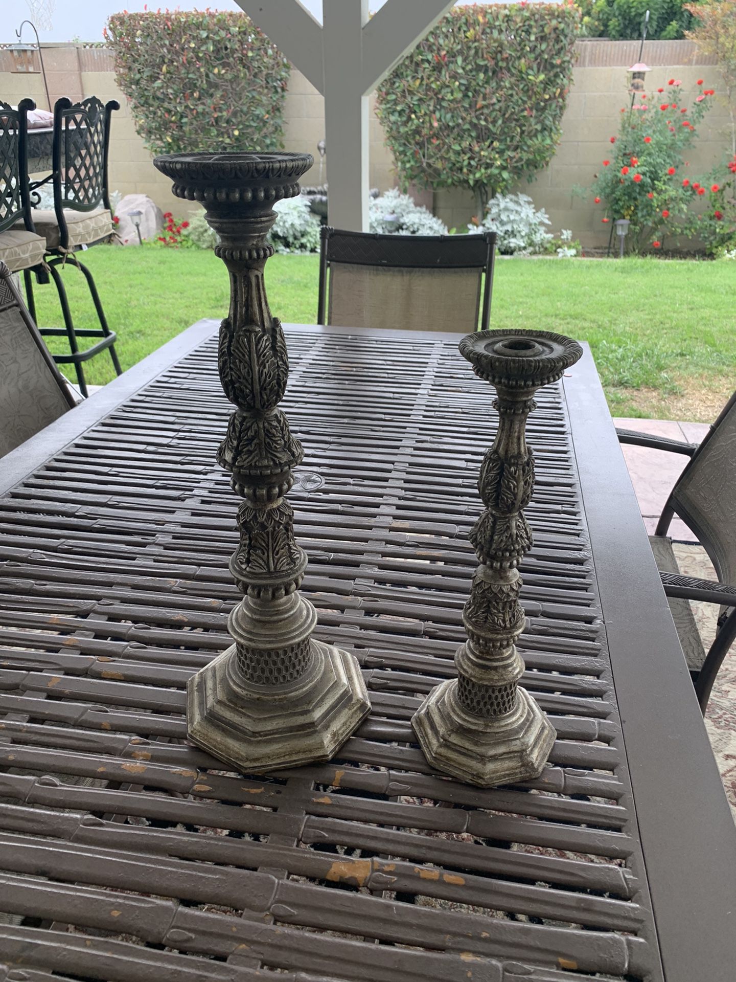 Two candlesticks  (19” And 15 “)