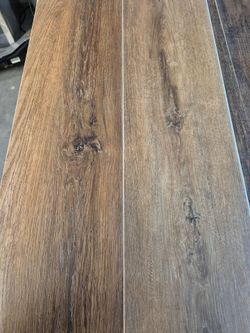 STAINMASTER Jamesville Oak 22-mil x 9-in W x 48-in L Waterproof Click Lock Luxury Vinyl Plank Flooring ( 21.3-sq ft Per Carton )