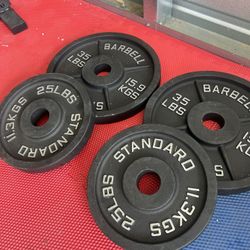 New pair of 25 and 35lb iron olympic plates  $120